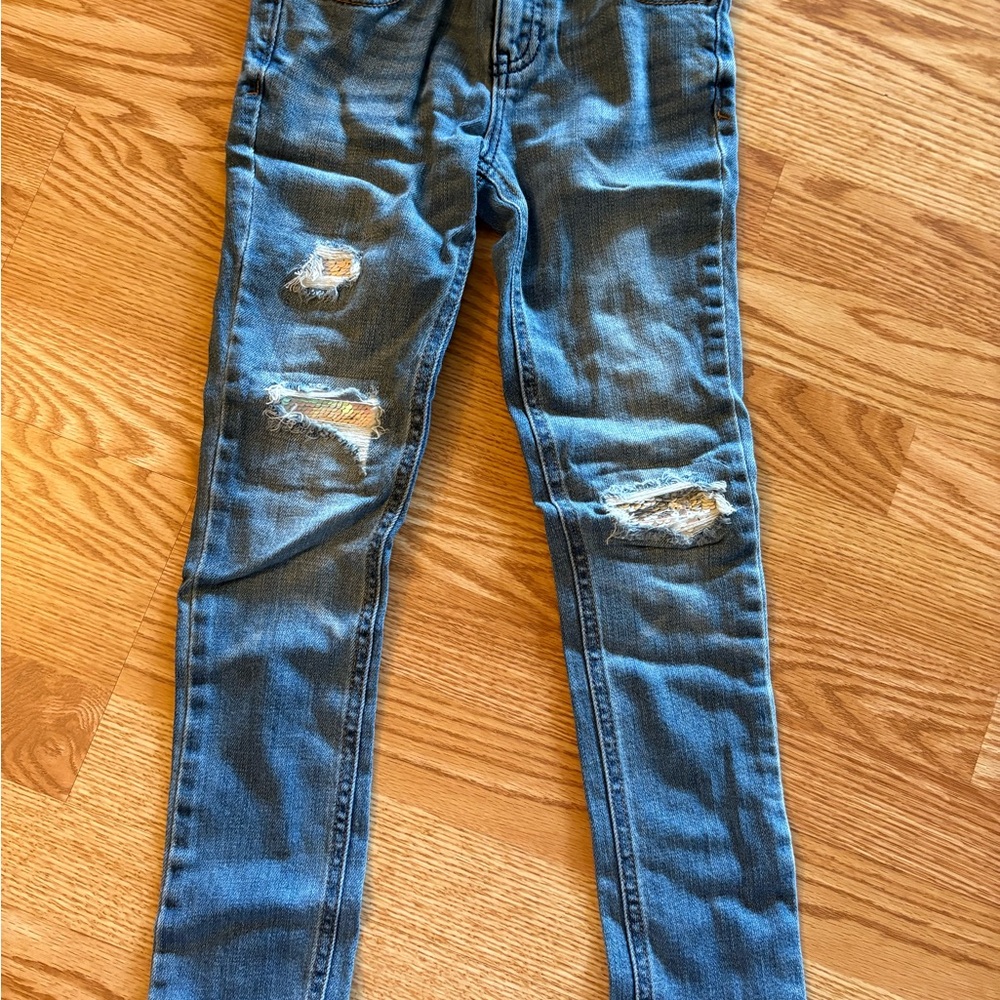 Distressed girls jeans